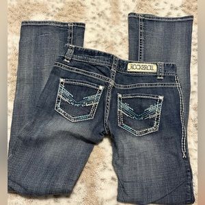 Rock and roll cowgirl! Low rise boot cut jeans